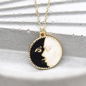 Kissing Figures Necklace